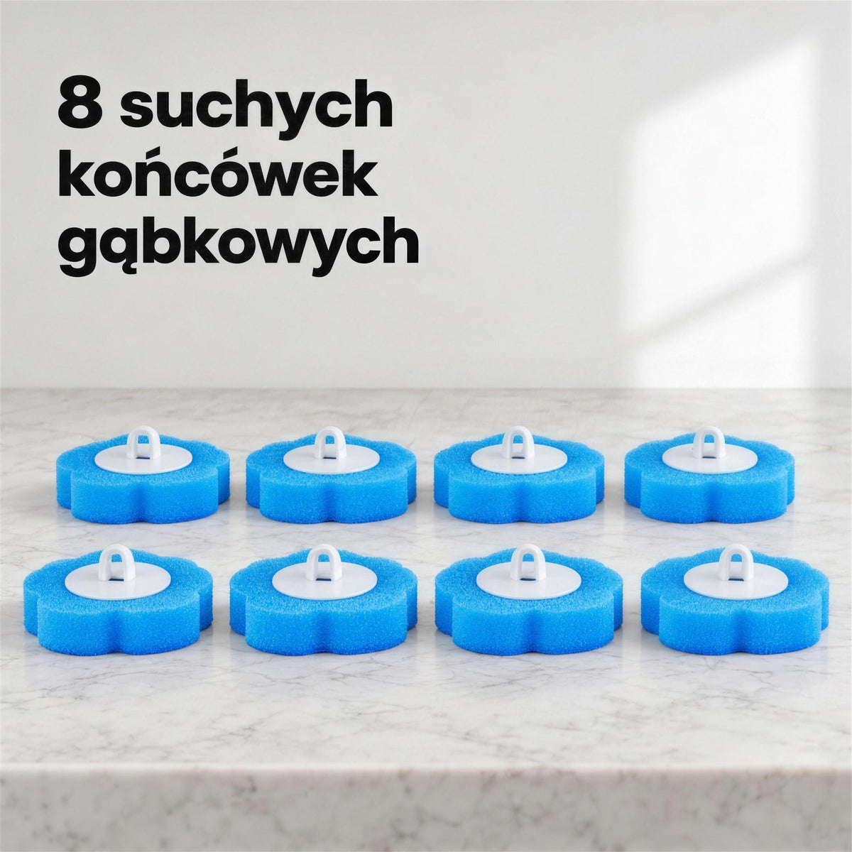 Osiem suchych gąbkowych końcówek do szczotki WC ułożonych w dwóch rzędach